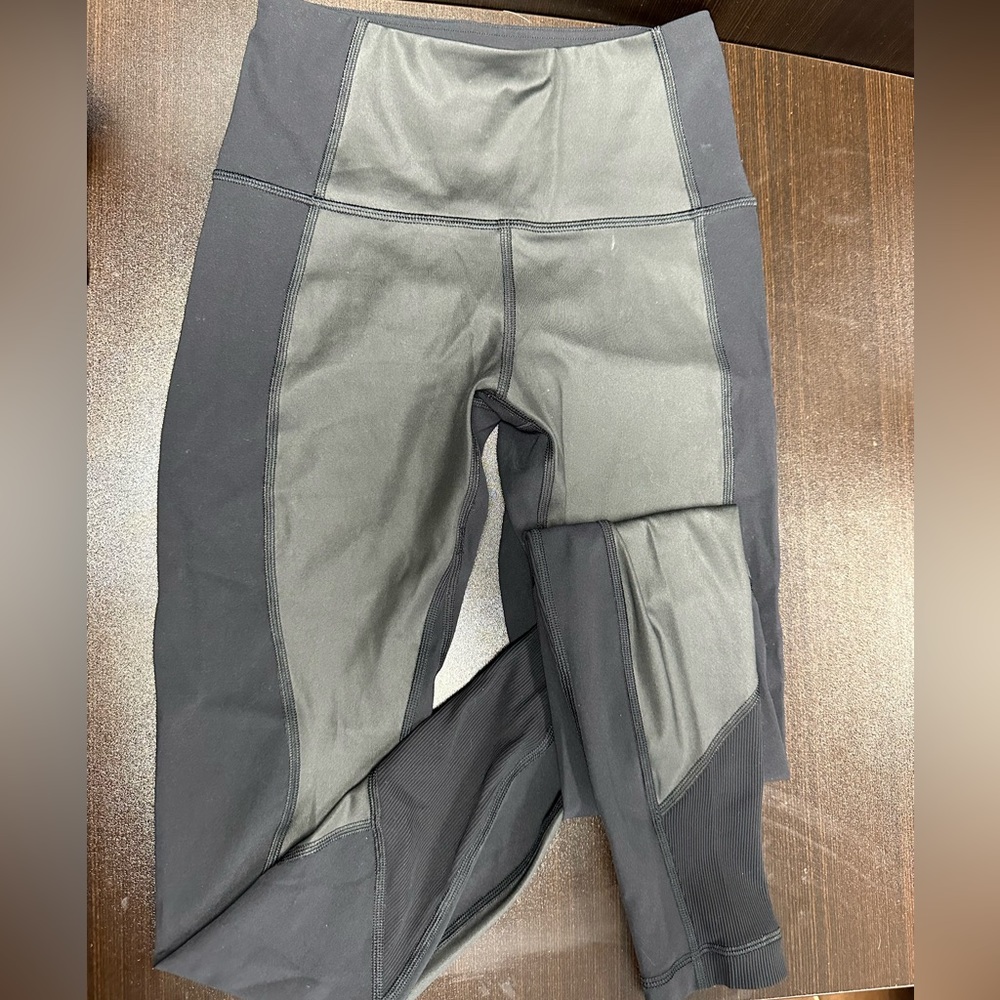 Lululemon mixed fabric black leggings. Size 4, like new.